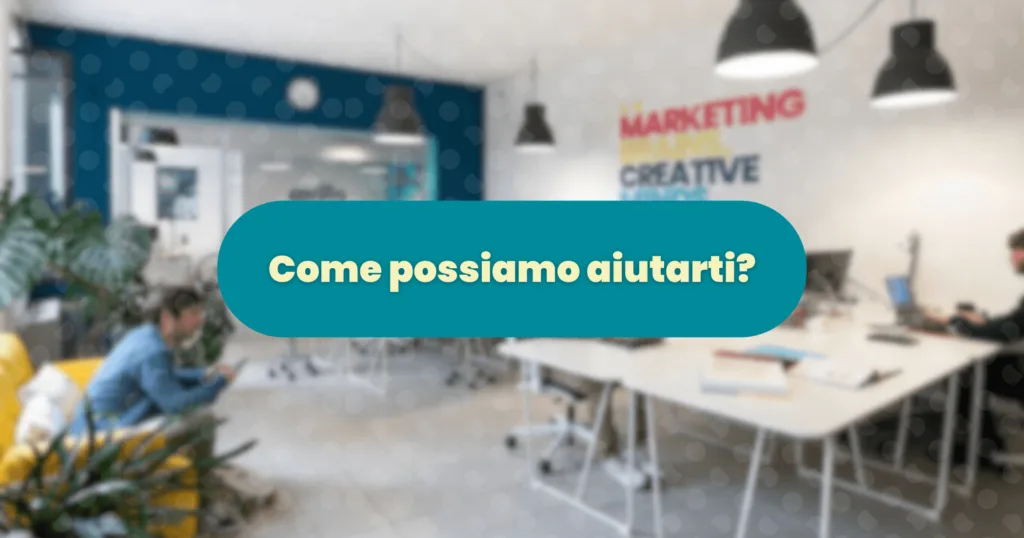 Foto interno agenzia Corilla con sfondo sfocato e pillola con scritta "Come possiamo aiutarti?"